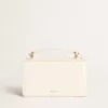 Bolso Venezia pequeño en piel color mantequilla con detalles dorados Bolso Venezia pequeño en piel color mantequilla con detalles dorados