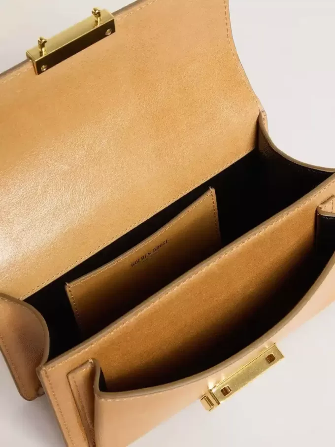 Bolso Venezia pequeño en piel color tabaco con detalles dorados Bolso Venezia pequeño en piel color tabaco con detalles dorados