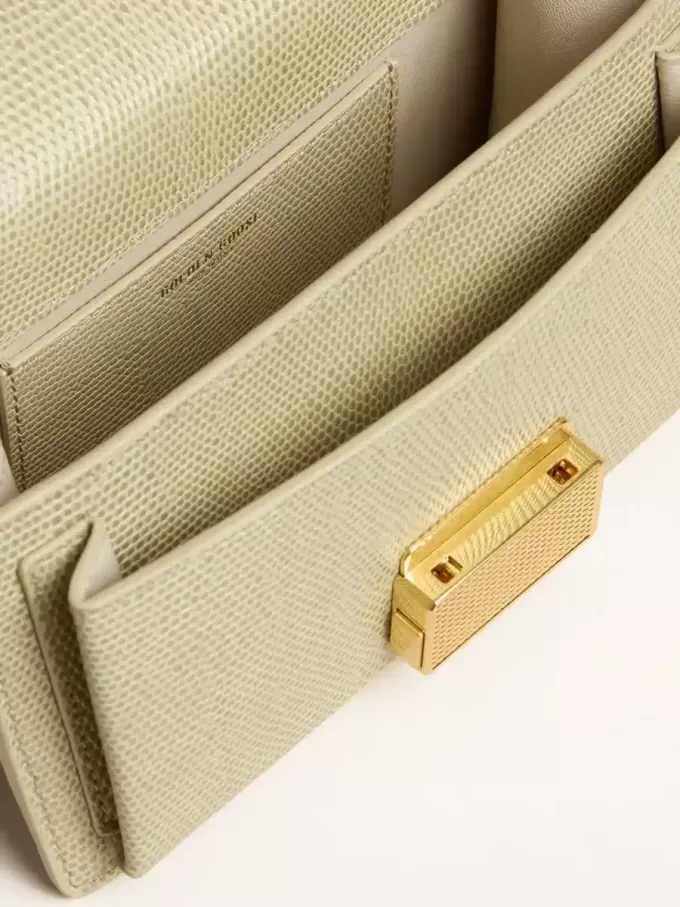 Bolso Venezia pequeño en piel con estampado de pitón verde claro y detalles dorados Bolso Venezia pequeño en piel con estampado de pitón verde claro y detalles dorados