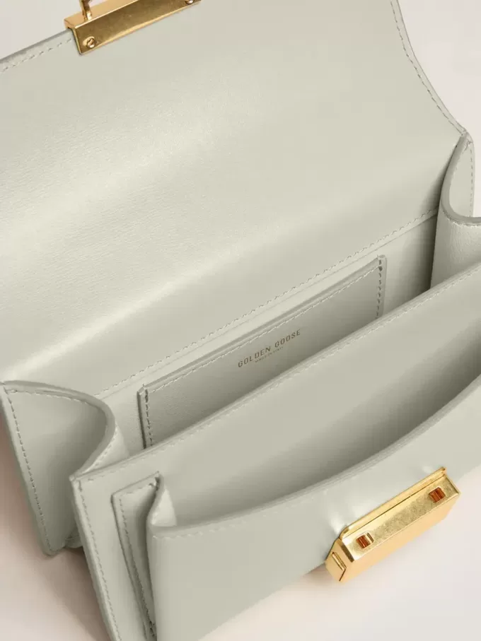 Bolso Venezia pequeño en piel gris mineral con detalles dorados Bolso Venezia pequeño en piel gris mineral con detalles dorados