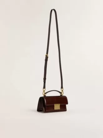 Bolso Venezia pequeño en piel laminada marrón oscuro con detalles dorados Bolso Venezia pequeño en piel laminada marrón oscuro con detalles dorados