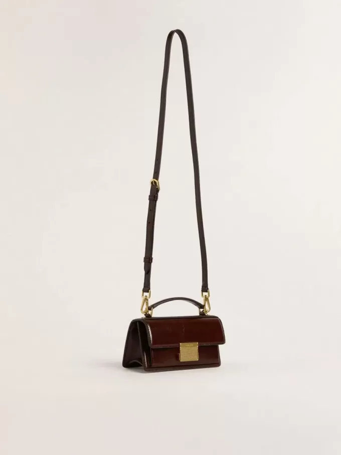 Bolso Venezia pequeño en piel laminada marrón oscuro con detalles dorados Bolso Venezia pequeño en piel laminada marrón oscuro con detalles dorados