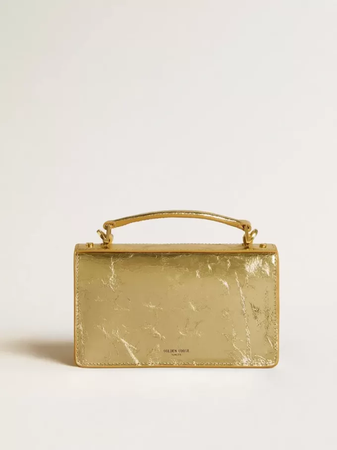 Bolso Venezia pequeño en piel metalizada dorada con detalles dorados. Bolso Venezia pequeño en piel metalizada dorada con detalles dorados.