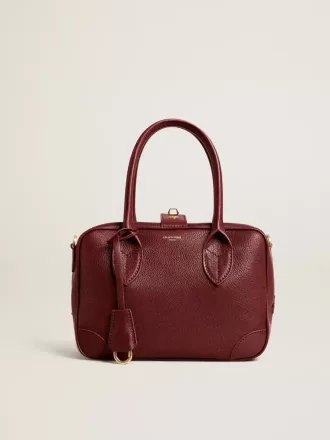 Bolso Vita en piel burdeos con detalles dorados