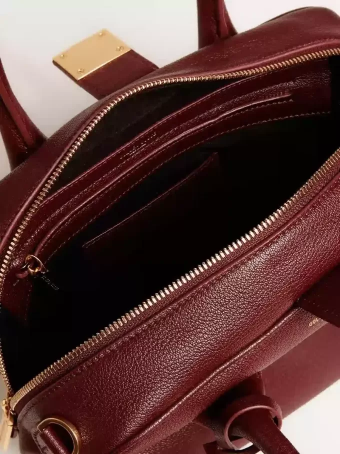 Bolso Vita en piel burdeos con detalles dorados Bolso Vita en piel burdeos con detalles dorados