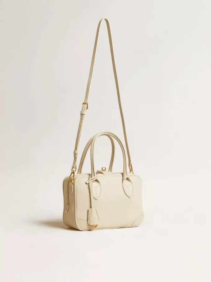Bolso Vita en piel color mantequilla con detalles dorados Bolso Vita en piel color mantequilla con detalles dorados