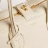 Bolso Vita en piel color mantequilla con detalles dorados Bolso Vita en piel color mantequilla con detalles dorados