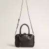Bolso Vita en piel de oveja negra con detalles dorados