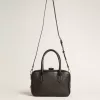 Bolso Vita en piel de oveja negra con detalles dorados