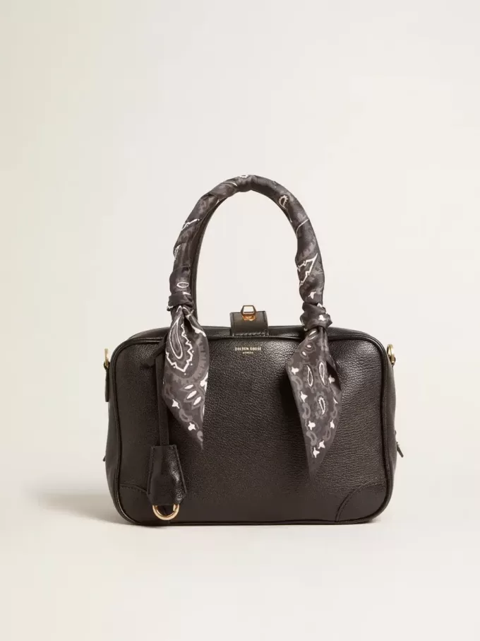 Bolso Vita en piel de oveja negra con detalles dorados