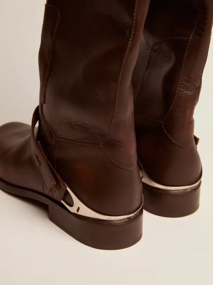 Botas Charlie para mujer en piel marrón oscuro y abrazadera en el talón Botas Charlie para mujer en piel marrón oscuro y abrazadera en el talón