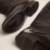 Botas de mujer de piel negra con abrazadera en el talón Botas de mujer de piel negra con abrazadera en el talón