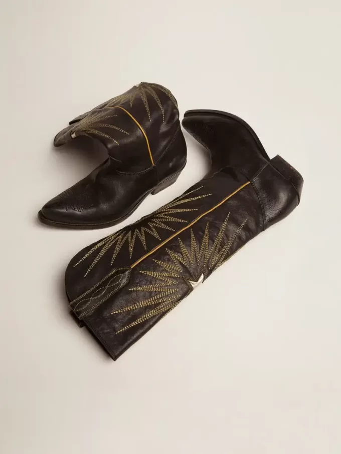 Botas Wish Star para mujer en piel negra con estrella incrustada en piel laminada platino Botas Wish Star para mujer en piel negra con estrella incrustada en piel laminada platino