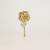 Broche dorado con diseño floral Broche dorado con diseño floral
