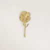 Broche dorado con diseño floral Broche dorado con diseño floral