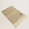 Bufanda CNY de lana de alpaca beige con flecos Bufanda CNY de lana de alpaca beige con flecos