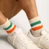 Calcetines blancos con acabado desgastado y rayas verdes y naranjas Calcetines blancos con acabado desgastado y rayas verdes y naranjas