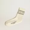 Calcetines blancos con detalles desgastados y rayas grises Calcetines blancos con detalles desgastados y rayas grises