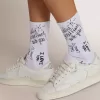 Calcetines blancos ópticos con letras negras Calcetines blancos ópticos con letras negras