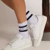 Calcetines de algodón con acabados desgastados, rayas azules y logotipo Calcetines de algodón con acabados desgastados, rayas azules y logotipo