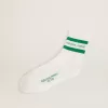 Calcetines de algodón con acabados desgastados, rayas verdes y logotipo Calcetines de algodón con acabados desgastados, rayas verdes y logotipo