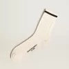 Calcetines largos acanalados en blanco vintage con raya negra Calcetines largos acanalados en blanco vintage con raya negra