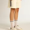 Calcetines largos acanalados en blanco vintage con raya negra Calcetines largos acanalados en blanco vintage con raya negra