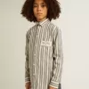 Camisa a rayas para niño con detalle Golden Dreamers en el bolsillo Camisa a rayas para niño con detalle Golden Dreamers en el bolsillo