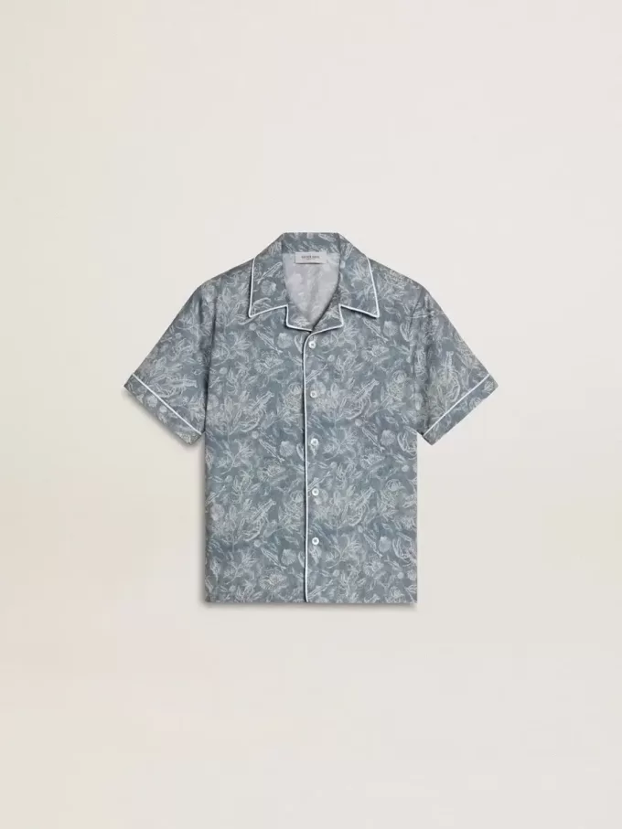 Camisa azul para niño con estampado blanco