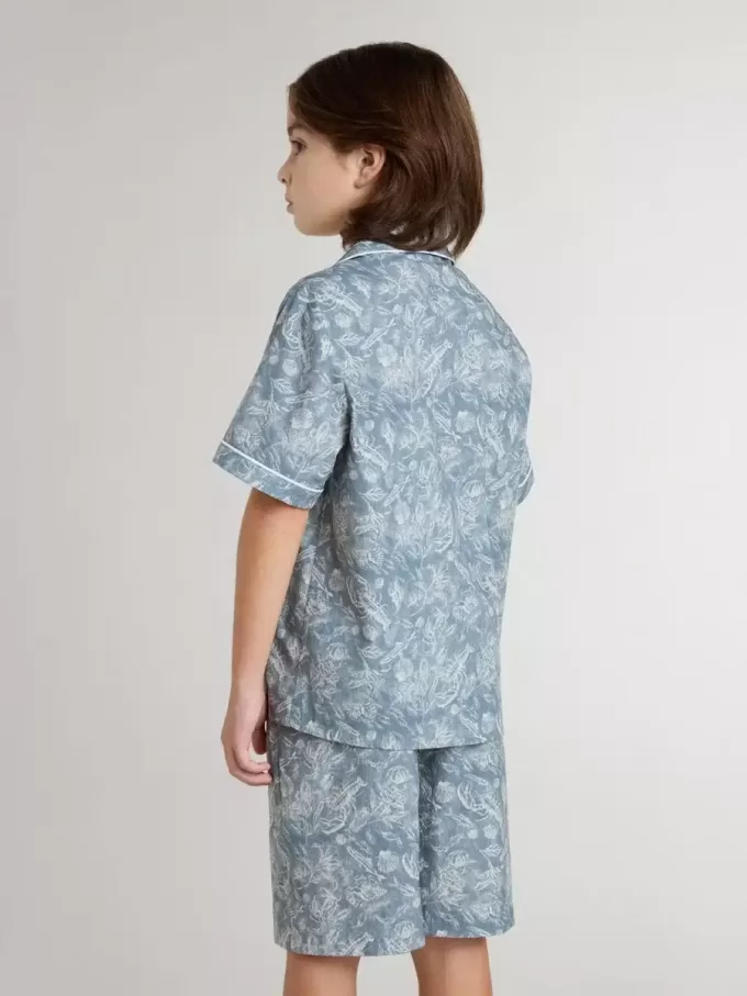 Camisa azul para niño con estampado blanco