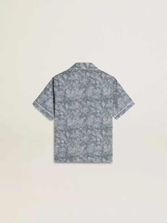 Camisa azul para niño con estampado blanco