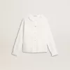 Camisa blanca de algodón con bordado inglés para niña