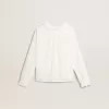 Camisa blanca de algodón con bordado inglés para niña