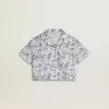 Camisa corta blanca para niña con estampado azul