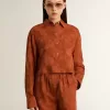 Camisa corta de mujer en jacquard rojo ladrillo con mangas anchas Camisa corta de mujer en jacquard rojo ladrillo con mangas anchas