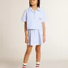 Camisa corta de niña de algodón azul claro a rayas Camisa corta de niña de algodón azul claro a rayas