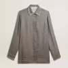 Camisa de mujer verde de mezcla de viscosa y seda con estampado floral Camisa de mujer verde de mezcla de viscosa y seda con estampado floral
