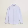 Camisa de rayas para niña con letras bordadas en el bolsillo