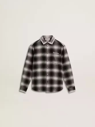 Camisa infantil a cuadros blancos y negros con bordados blancos