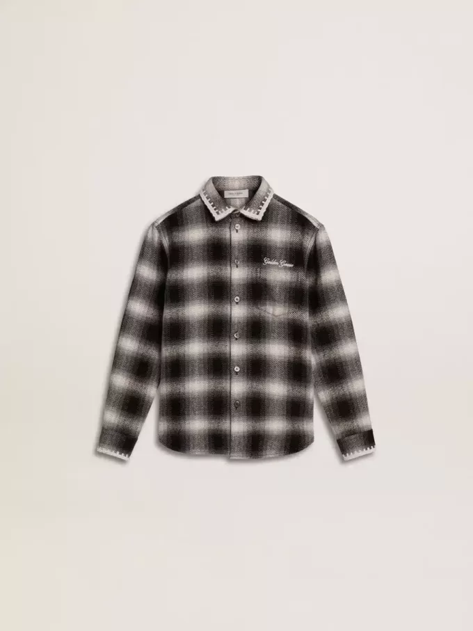 Camisa infantil a cuadros blancos y negros con bordados blancos Camisa infantil a cuadros blancos y negros con bordados blancos
