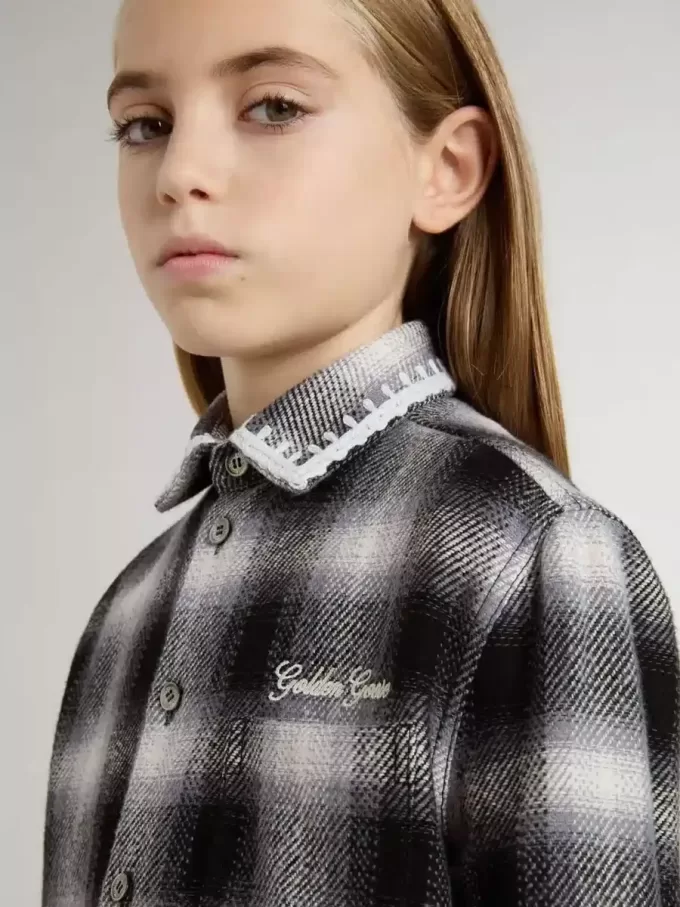 Camisa infantil a cuadros blancos y negros con bordados blancos Camisa infantil a cuadros blancos y negros con bordados blancos