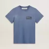 Camiseta azul claro descolorida para mujer con estampado en el pecho Camiseta azul claro descolorida para mujer con estampado en el pecho