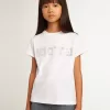 Camiseta blanca con letras doradas en cristales en el centro Camiseta blanca con letras doradas en cristales en el centro