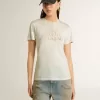 Camiseta blanca de mujer con estampado en la parte delantera Camiseta blanca de mujer con estampado en la parte delantera