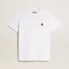 Camiseta blanca de mujer con estrella burdeos en la parte delantera Camiseta blanca de mujer con estrella burdeos en la parte delantera