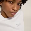 Camiseta blanca de mujer con logotipo y estrella plateados brillantes Camiseta blanca de mujer con logotipo y estrella plateados brillantes