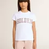Camiseta blanca para niña con letras doradas y purpurina rosa. Camiseta blanca para niña con letras doradas y purpurina rosa.