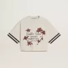 Camiseta corta oversize para mujer en jersey blanco con bordados y estampado «Venezia Mediterraneo». Camiseta corta oversize para mujer en jersey blanco con bordados y estampado «Venezia Mediterraneo».