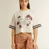 Camiseta corta oversize para mujer en jersey blanco con bordados y estampado «Venezia Mediterraneo». Camiseta corta oversize para mujer en jersey blanco con bordados y estampado «Venezia Mediterraneo».