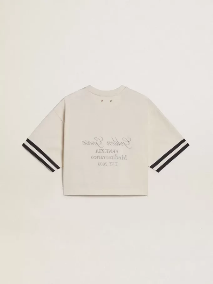 Camiseta corta oversize para mujer en jersey blanco con bordados y estampado «Venezia Mediterraneo». Camiseta corta oversize para mujer en jersey blanco con bordados y estampado «Venezia Mediterraneo».